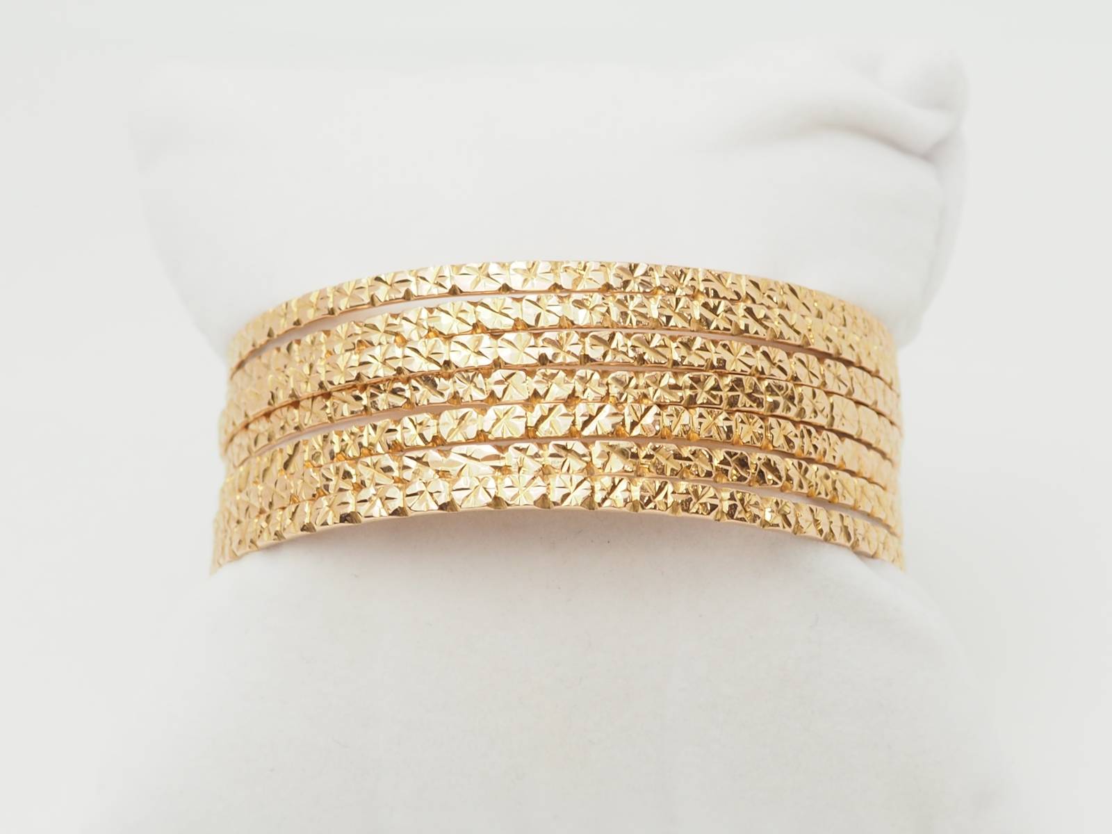 Bracelet semainier ciselé en or jaune 18 carats 75,90 grammes à Marseille