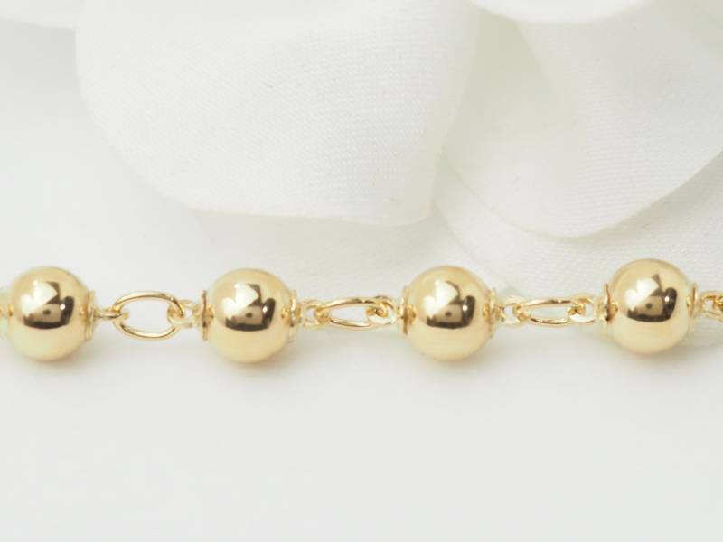 Bracelet boules en or jaune 18kt