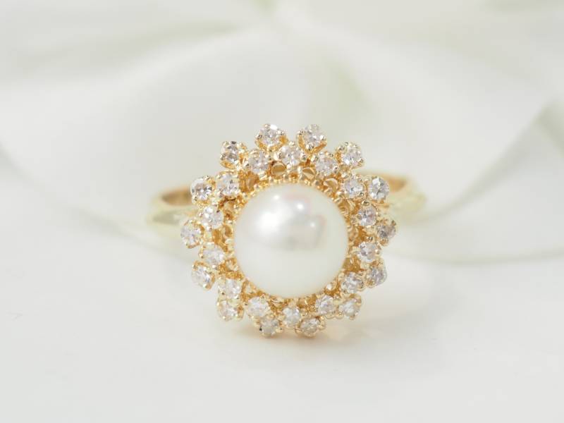 Bague en or jaune, perle de culture et diamants