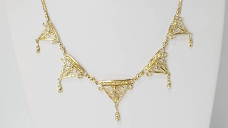 collier draperie en or près d'aix