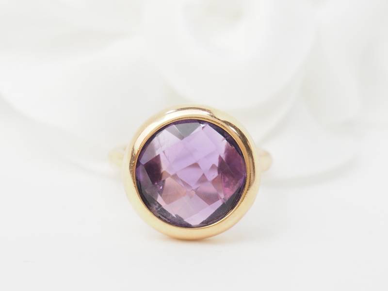 Bague ronde en or rose et améthyste