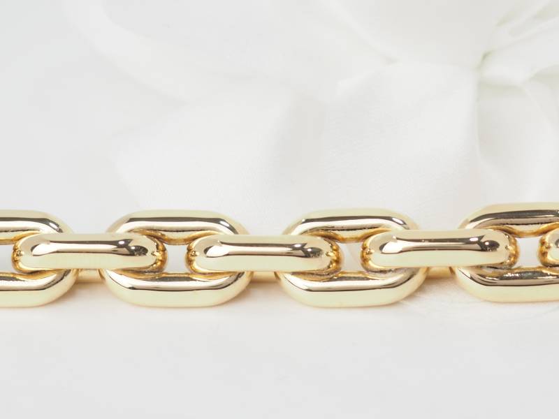 Bracelet en maille forçat limée en or jaune et diamant